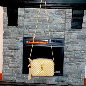 A calfskin crossbody inspired by vintage camera bag.